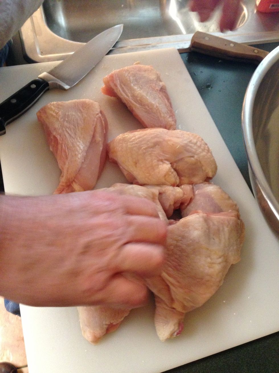 Cut up your chicken, leaving skin on. (For lower fat recipes, remove)