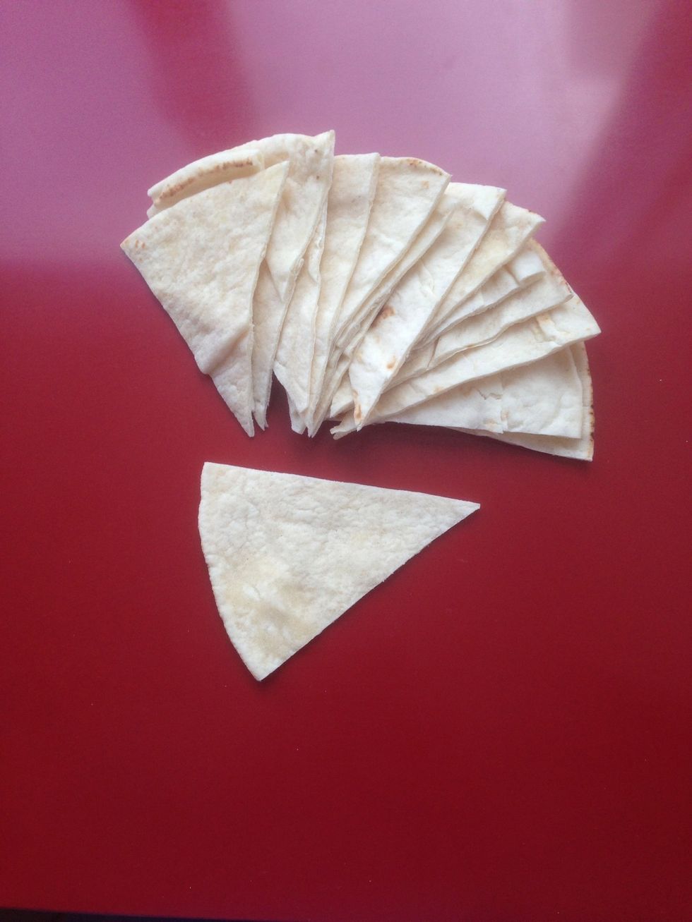 Cut up your flat bread into pizza-looking slices for the tahdig