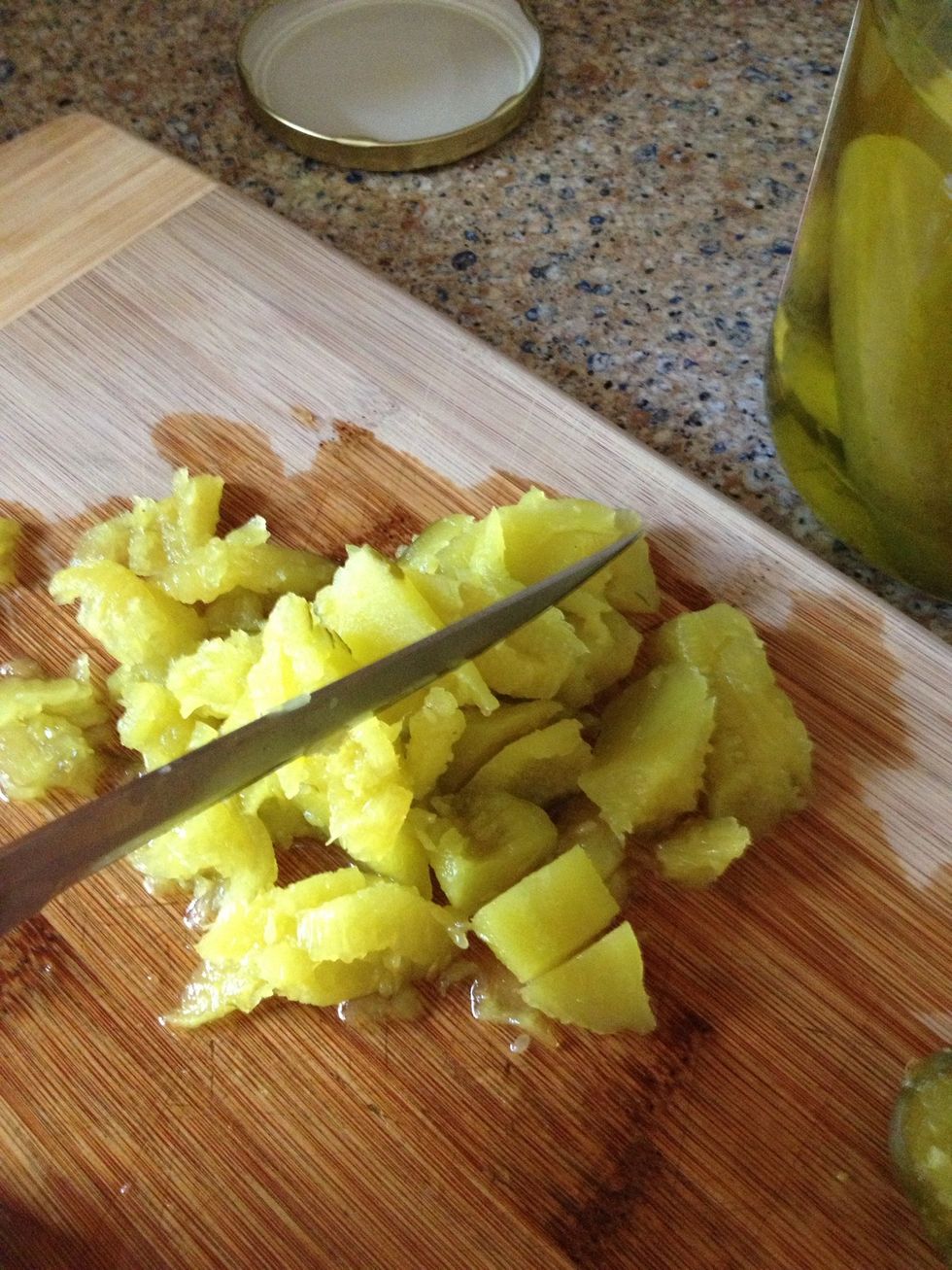 Cut up your scooped out pickle so you can add some of it...
