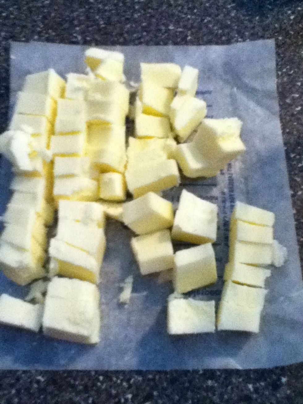 Cut up your stick of butter (or half cup).