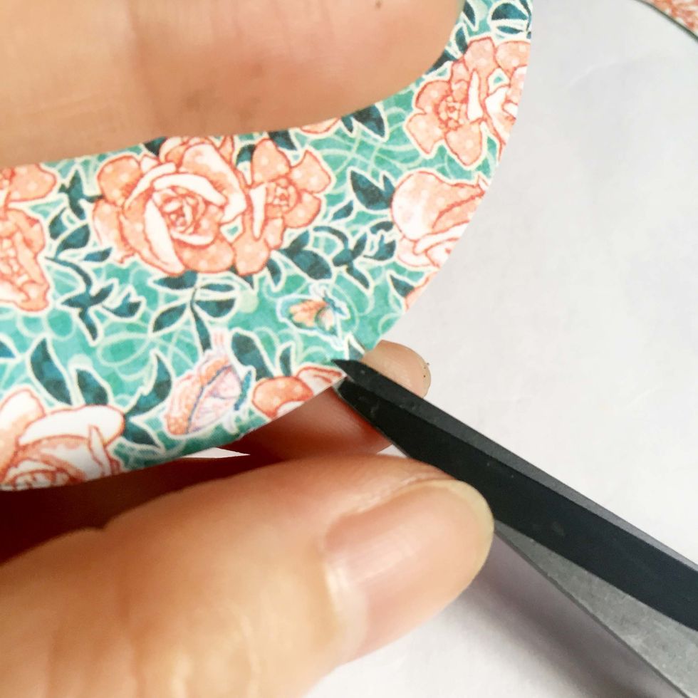 Cut very small snips around.