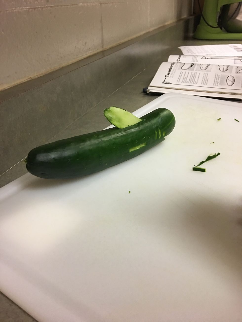 Cut whole on top and insert fun that was made from the bottom