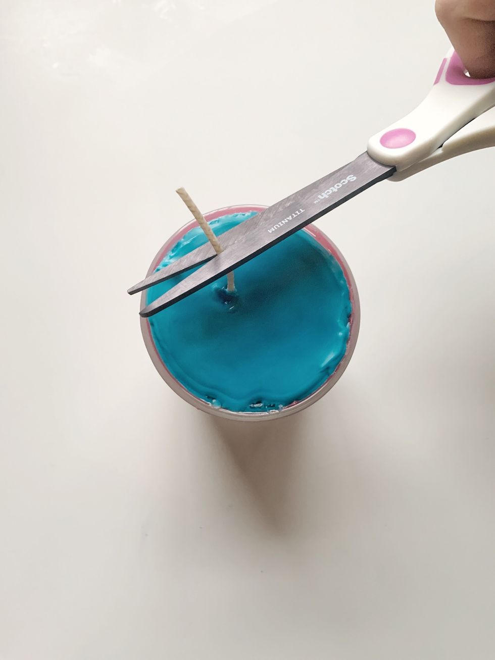 Cut wick to appropriate length.