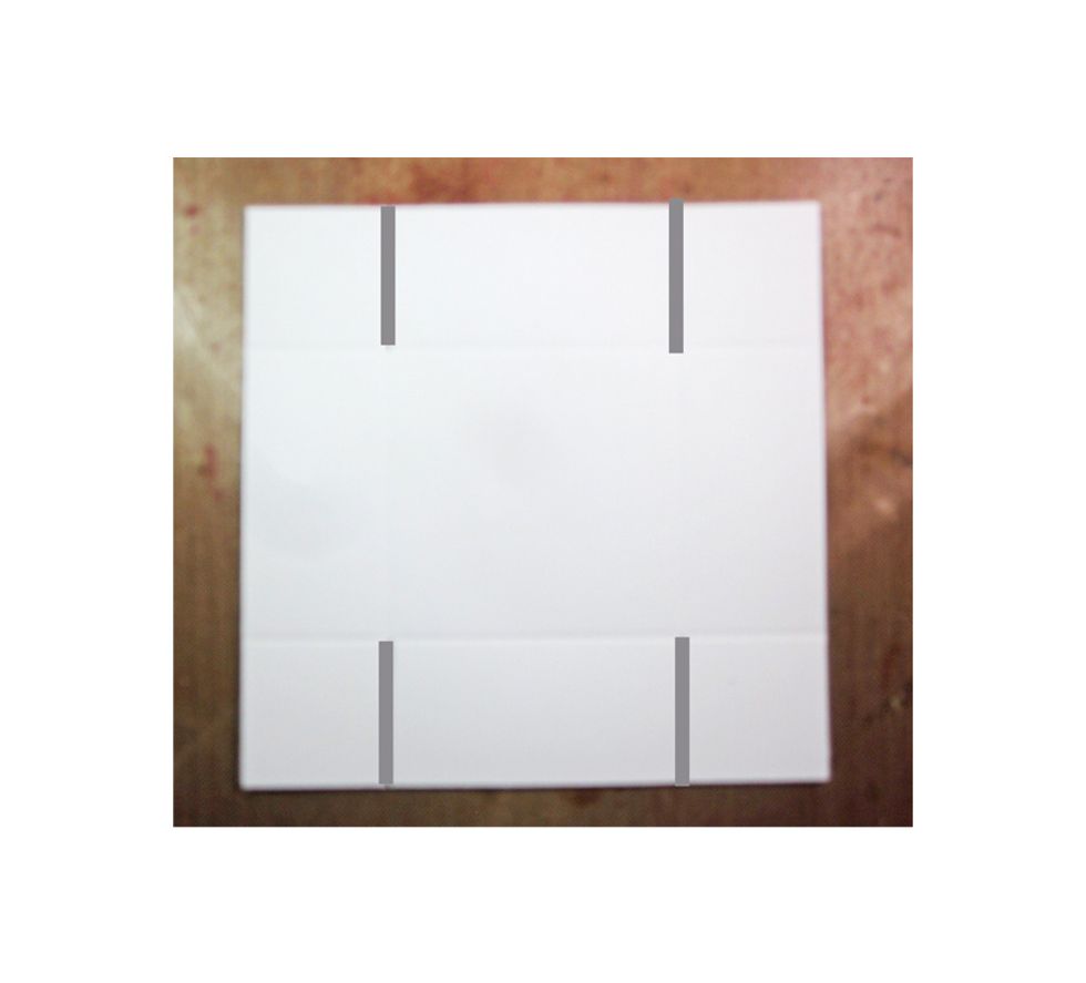 Cut with scissors on the scored line where I've highlighted in gray. This is going to make a little flap.