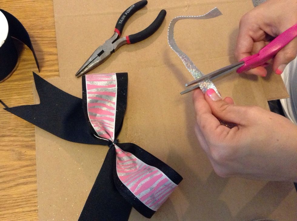 Cut with the piece with the scissors