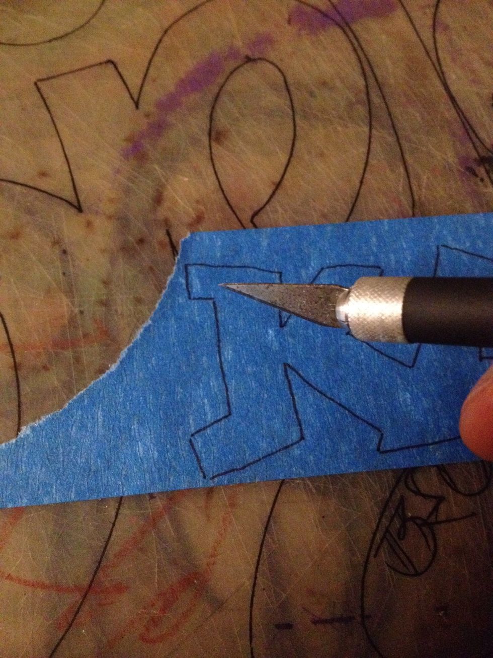 Cut with x-acto knife. As usual pls be careful when using sharp objects to avoid cutting yourself or damaging cutting area if not using a board