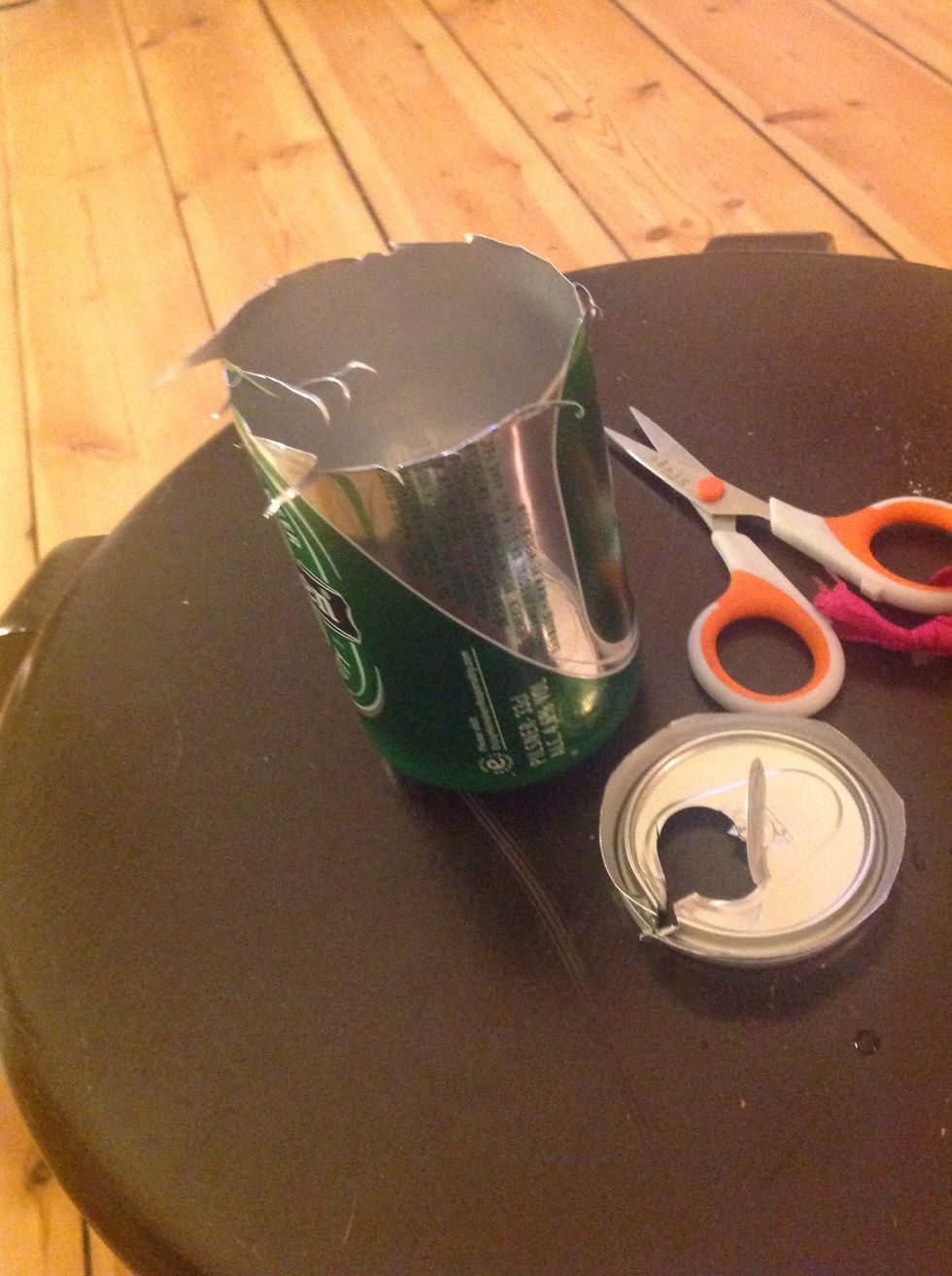 Cut with your scissors Down to that Line there is on the Can