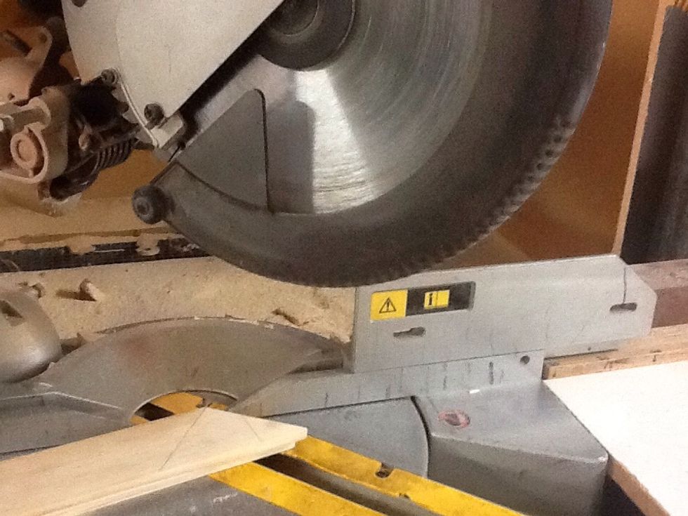 Cut wood into four pieces to make up the frame