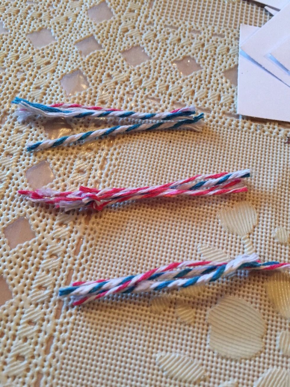 Cut you twine or ribbon into smaller pieces, these are approximately 3 inches long. Choose color of tassel according to your graduates school colors.