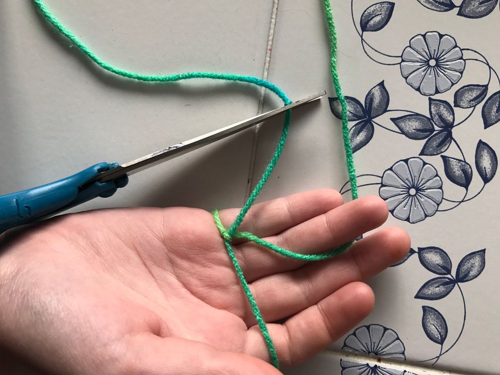 Cut your access yarn off, from the slip knot