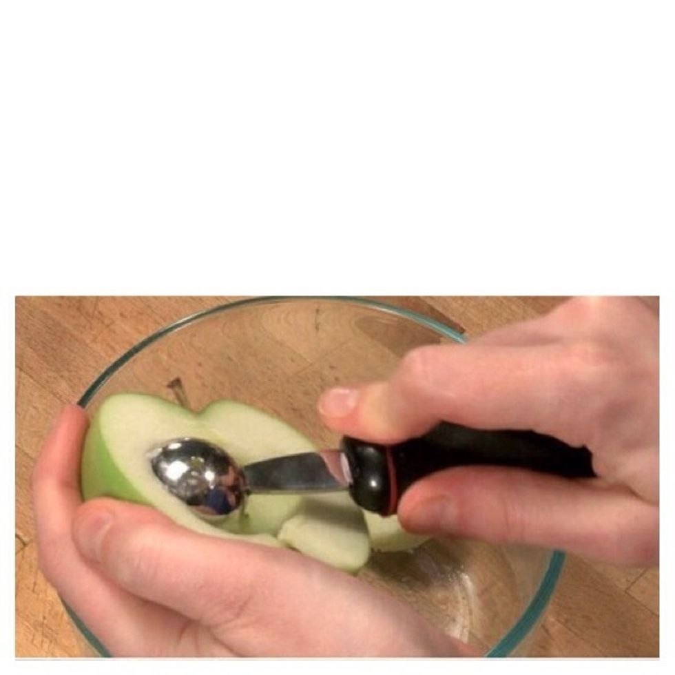 Cut your apples in half and use a melon baller to scoop out the insides, leaving the walls intact at about 1/2 to 1/4 inch thickness.