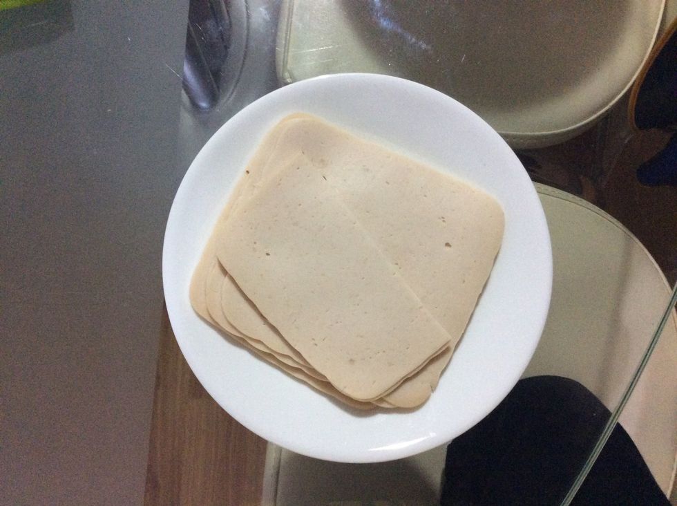 Cut your chicken breaks into thin slices so it can be placed on in your roll