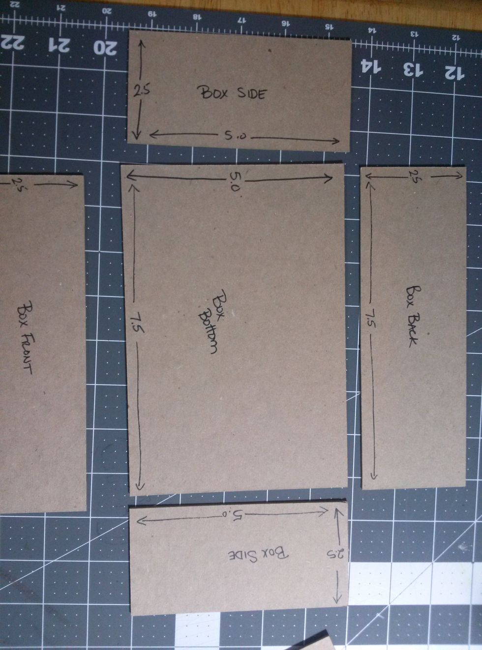 Cut your chipboard pieces as shown. Bottom: 5 X 7.5 inches, Long Sides: 2.5 X 7.5 inches (2), Short Sides 2.5 X 5 (2)