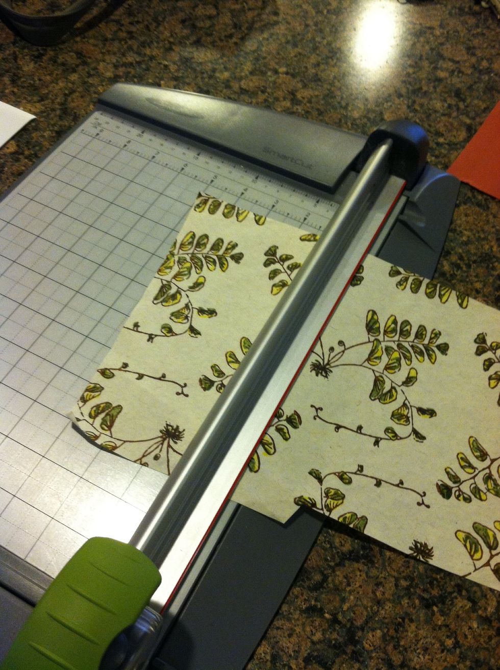 Cut your cover pieces to size, an inch to 1/2 inch bigger than the cardboard/book board
