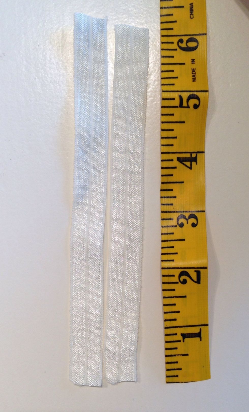 Cut your elastic to 6 inches.