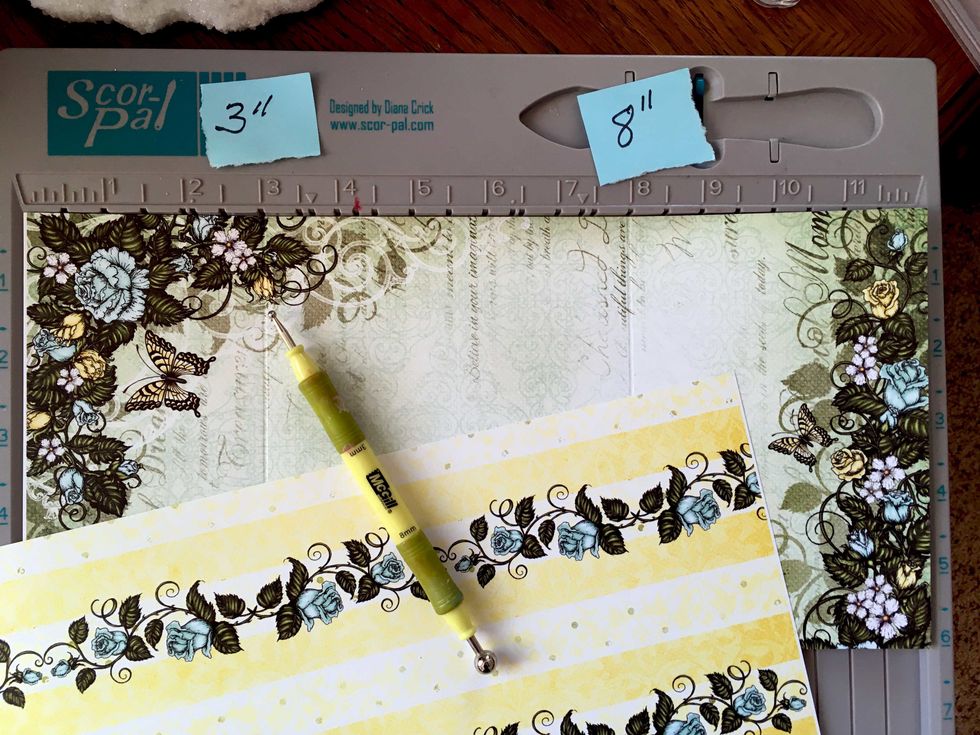 Cut your favorite 12" x 12" page in half making it 6" x 12".  Make sure you want the pattern to go in the direction you want before cutting it.  Score at 3" and 8"