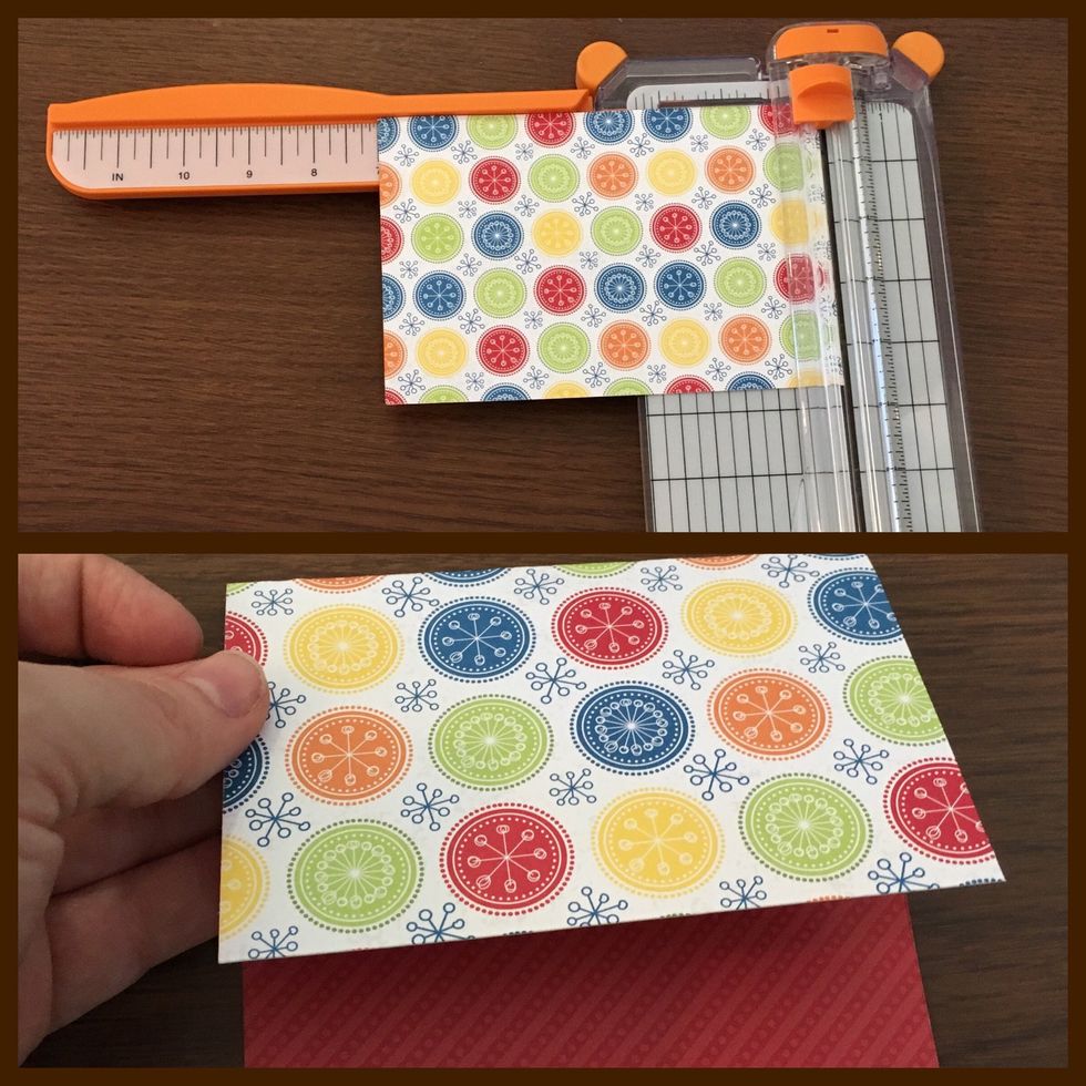 Cut your Kiwi Lane Live Life scrapbook paper the width of your gift bag and 7 inches long. Fold over with 3 inches on one side and 4 inches on the other.