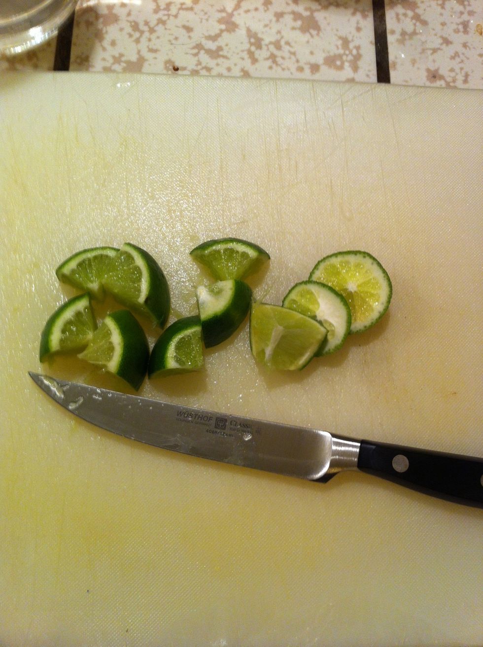 Cut your Lime into quarters and discard the ends. Tip: if your Lime is a little hard, you can pop it in the microwave for 5-10 secs to soften it up.
