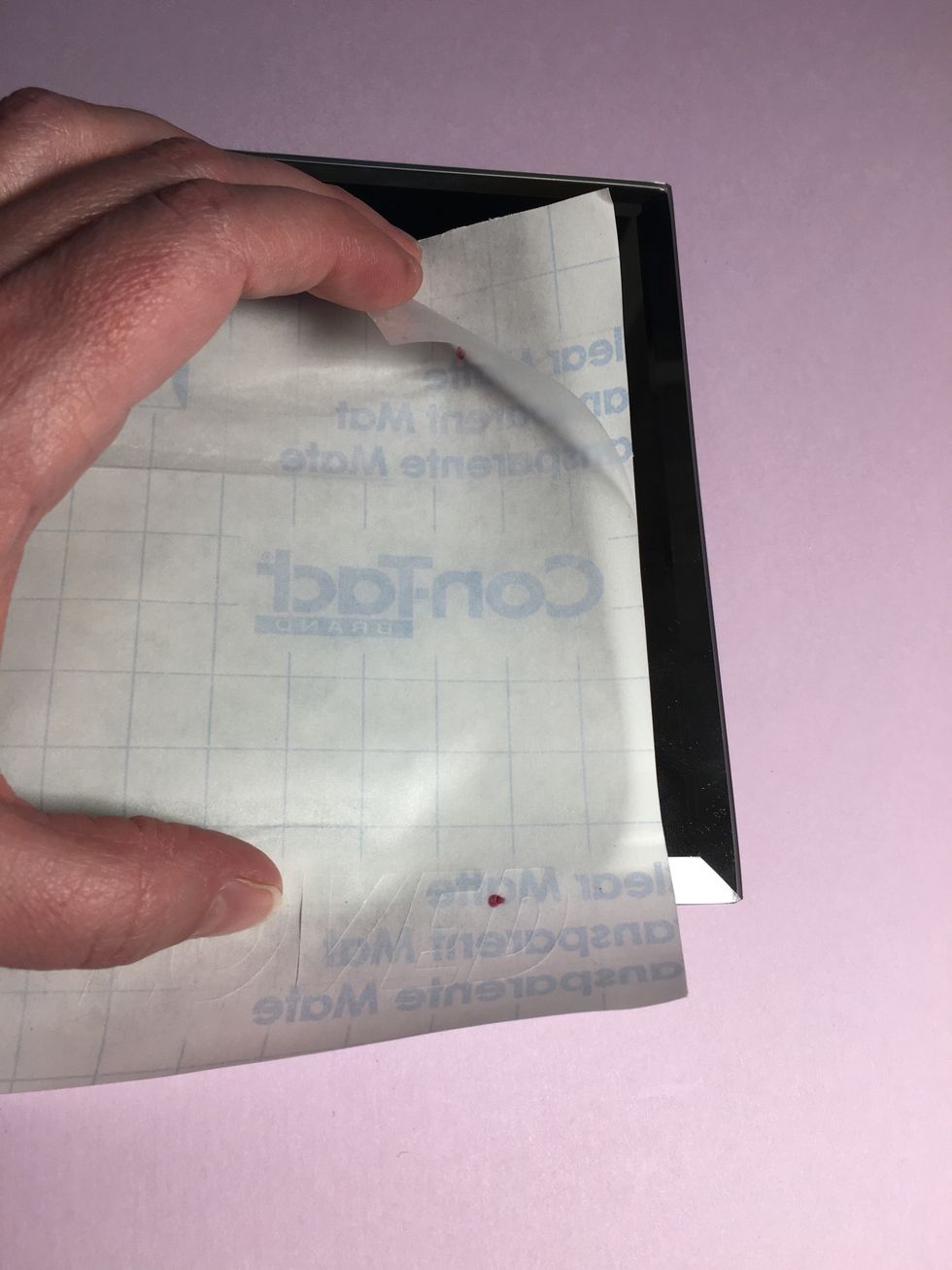 Cut your message. Use a sharp blade to clean up edges as necessary. Carefully peel the layers apart.