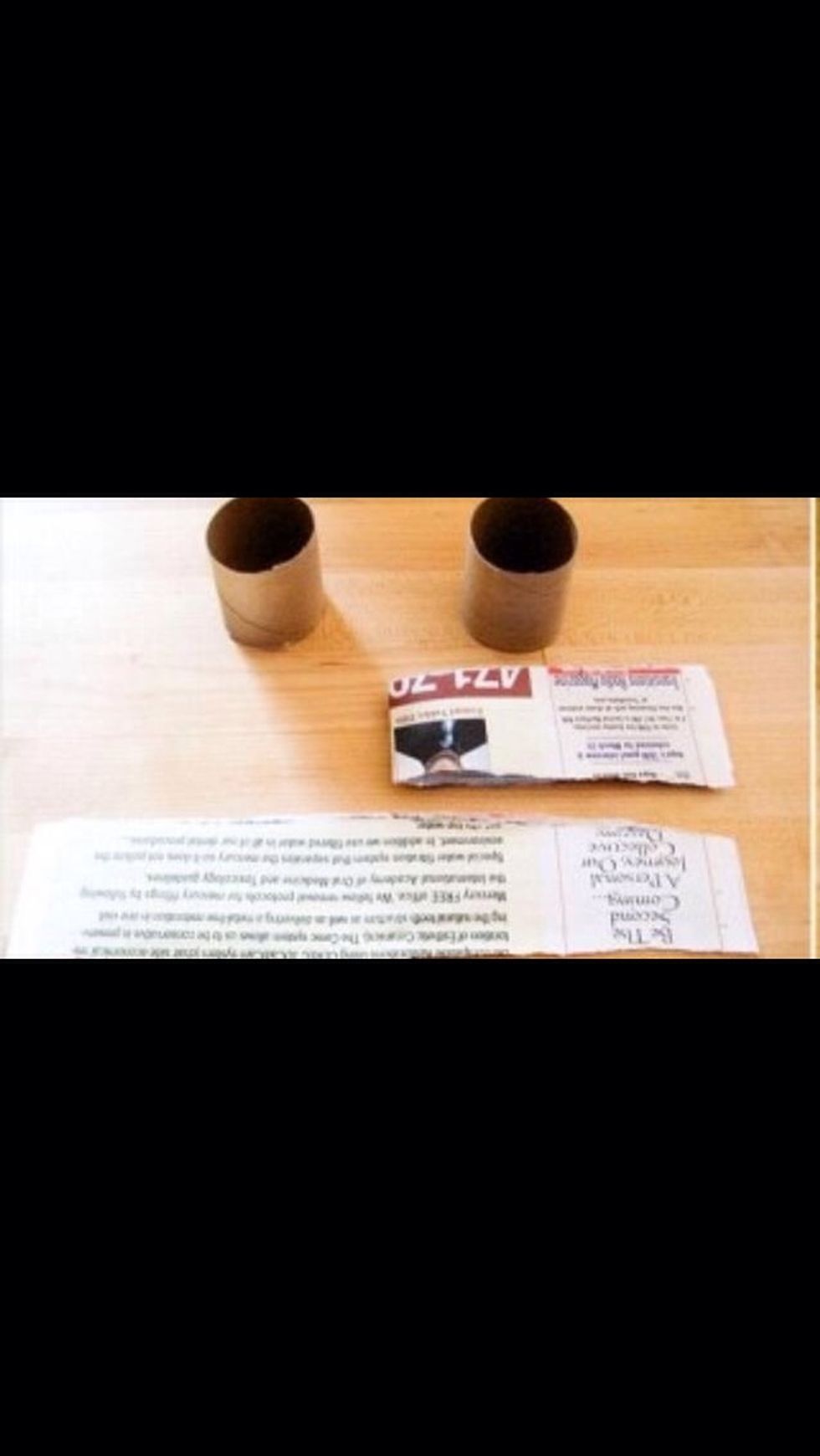 Cut your newspaper into strips the same length as your toilet paper roll. If you want you can cut the rolls in half.