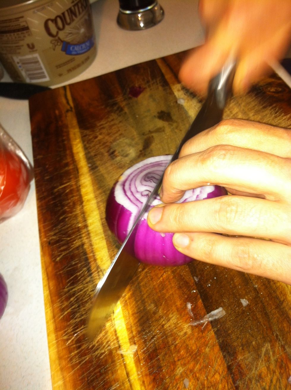 Cut your onion in half. Like so.