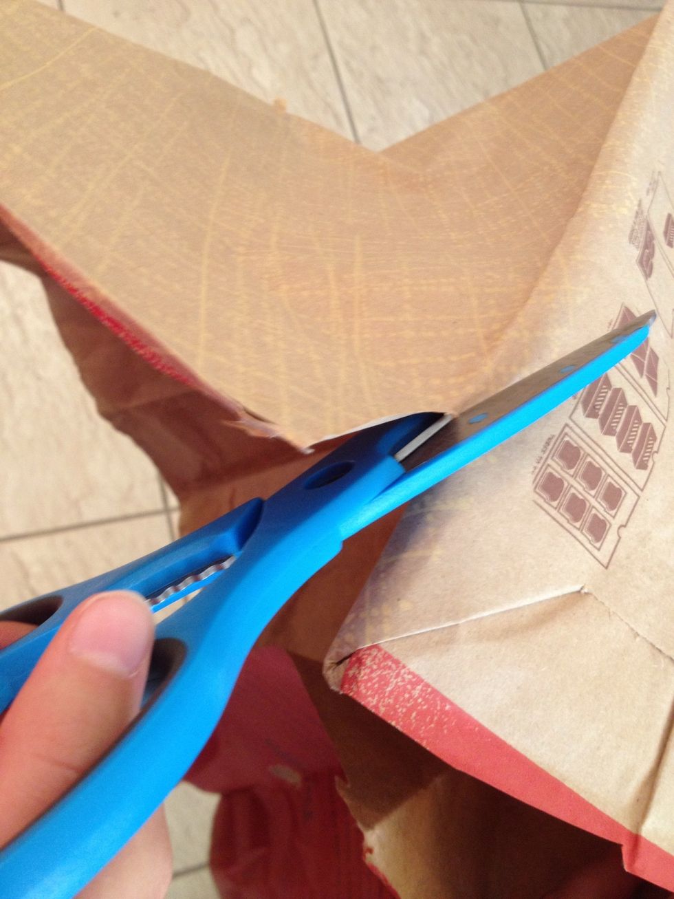 Cut your paper bag open; use as a drop cloth to protect your work surface.