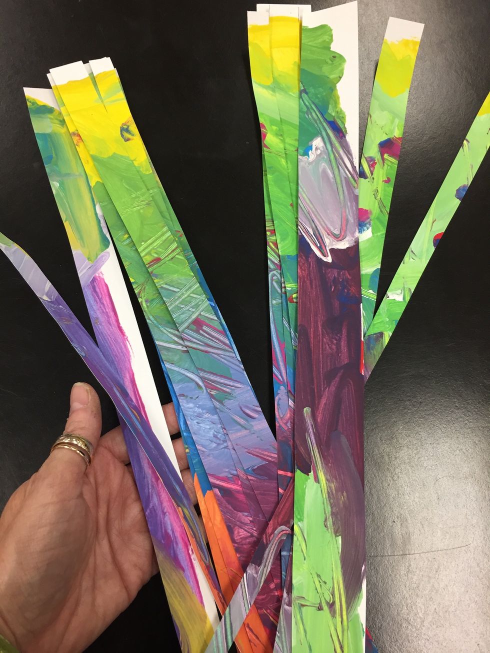 Cut your paper into thick and thin strips on the shorter side of paper.