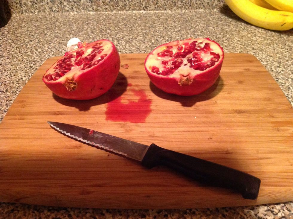 Cut your pomegranate into halves (or quadrants) like a true fruit ninja
