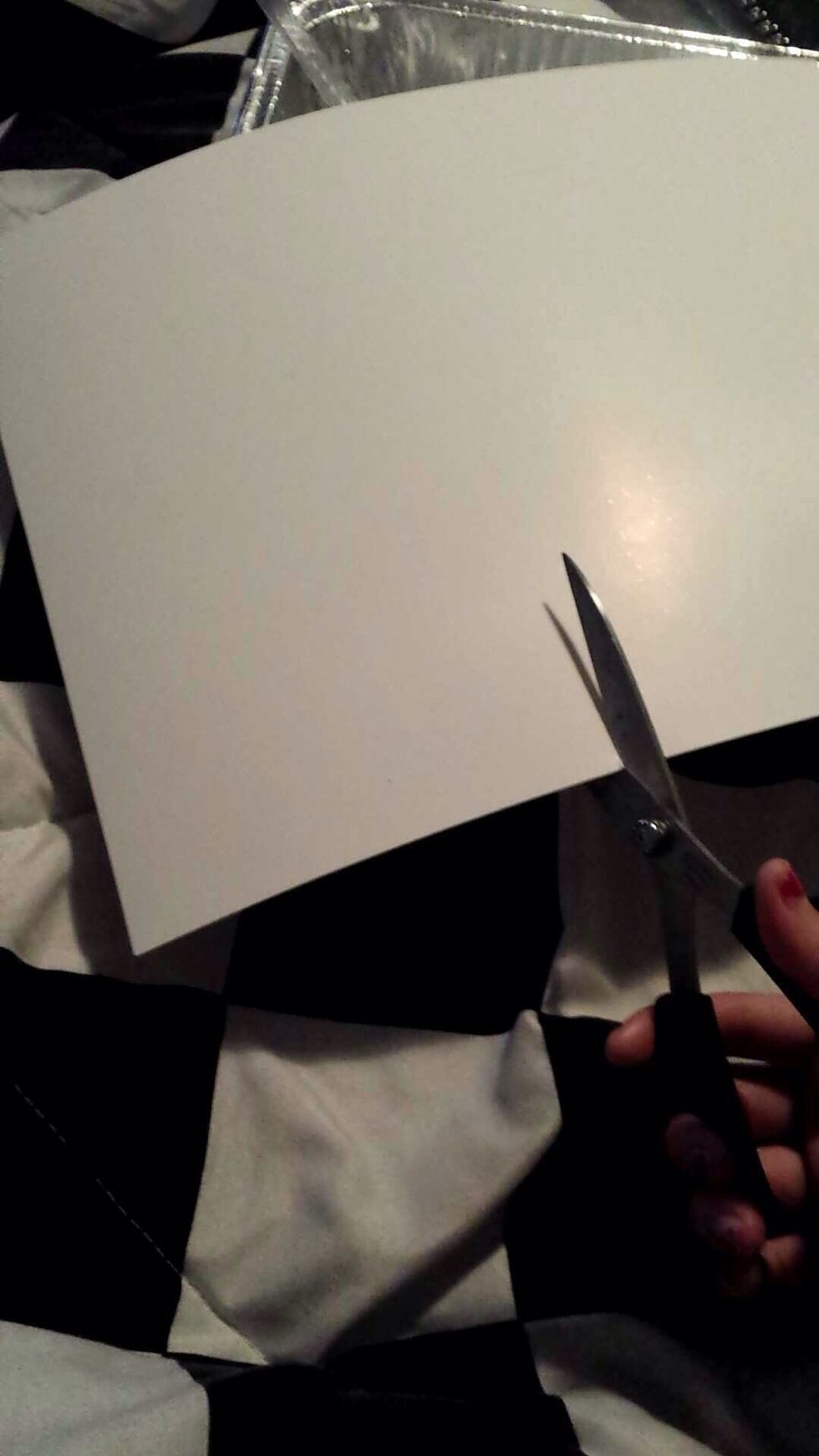 Cut your poster board in the size you like. Preferably to fit your cake pan.