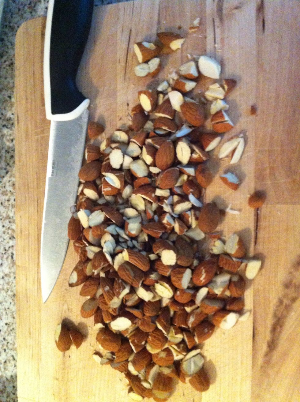 Cut your raw almonds to big chunks Note: you can substitute all or part of the almonds with raw cashews, peanuts, pecans as you like! I love almonds!!! :-D