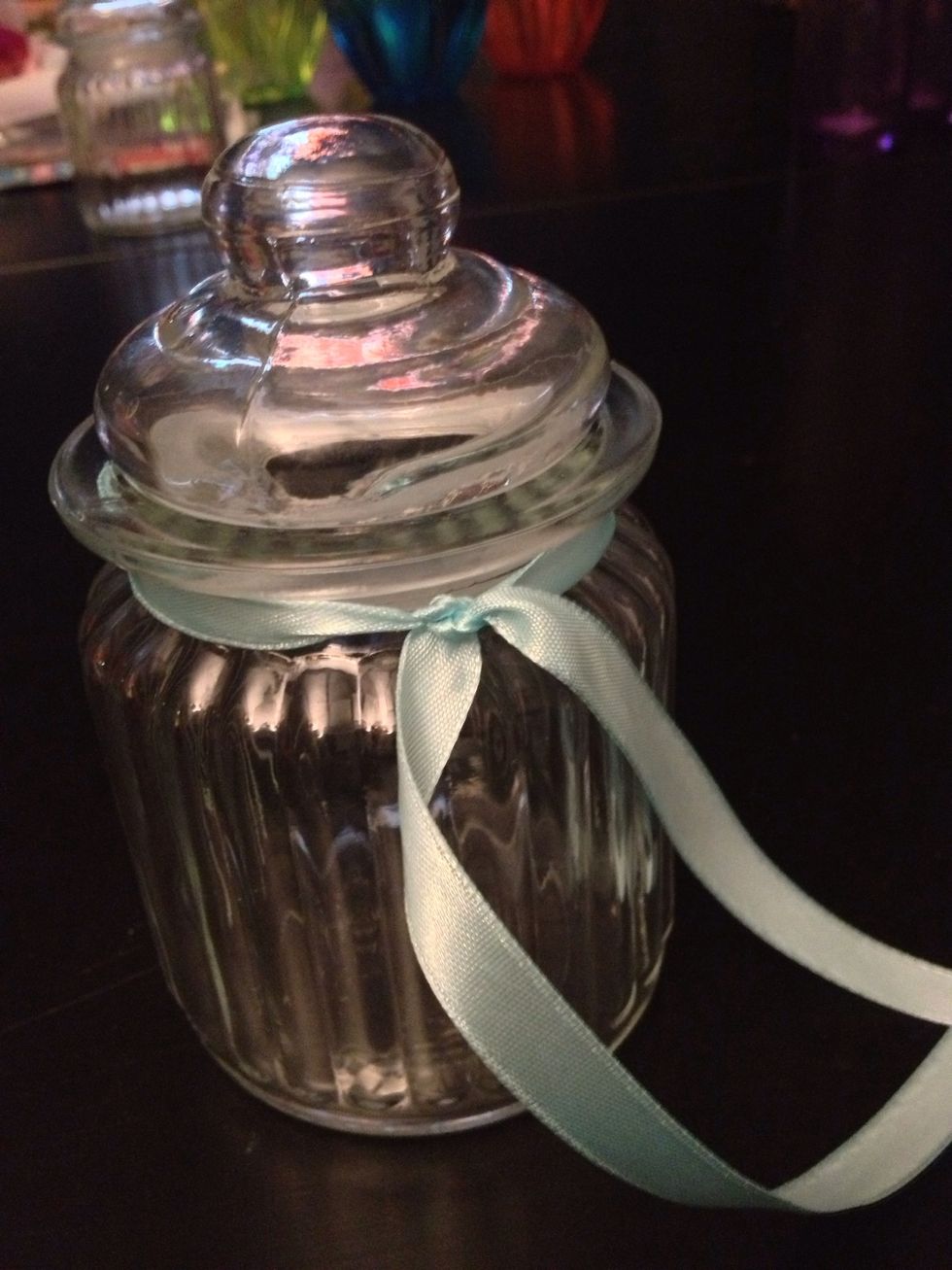 Cut your ribbon bigger then the bow you're going to create. Tie it with 2 knots so it will stick propperly.