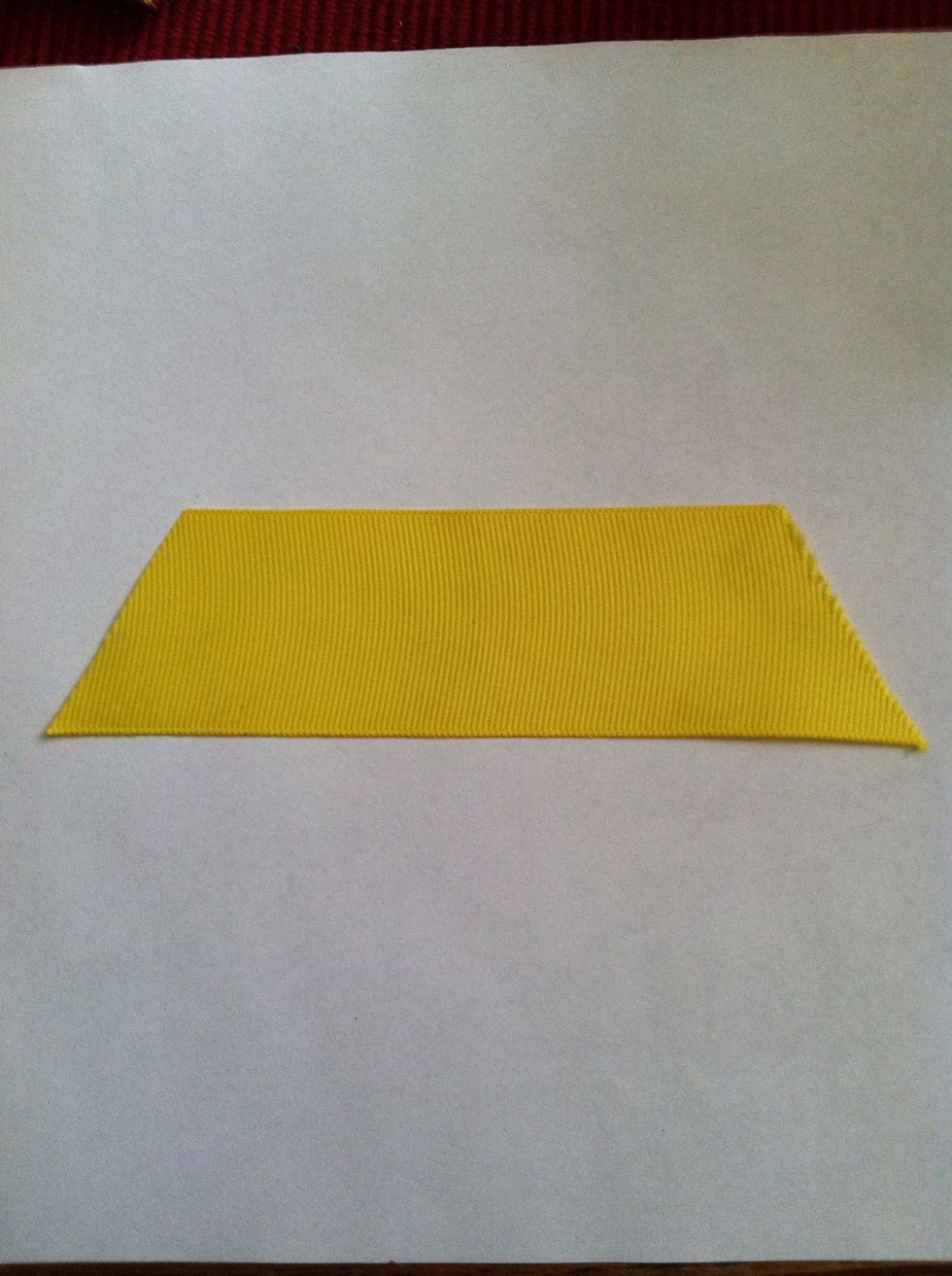 Cut your ribbon to your desired length, in a trapezoid shape. You will need 6 pieces. These were about 2inches at its longest side.