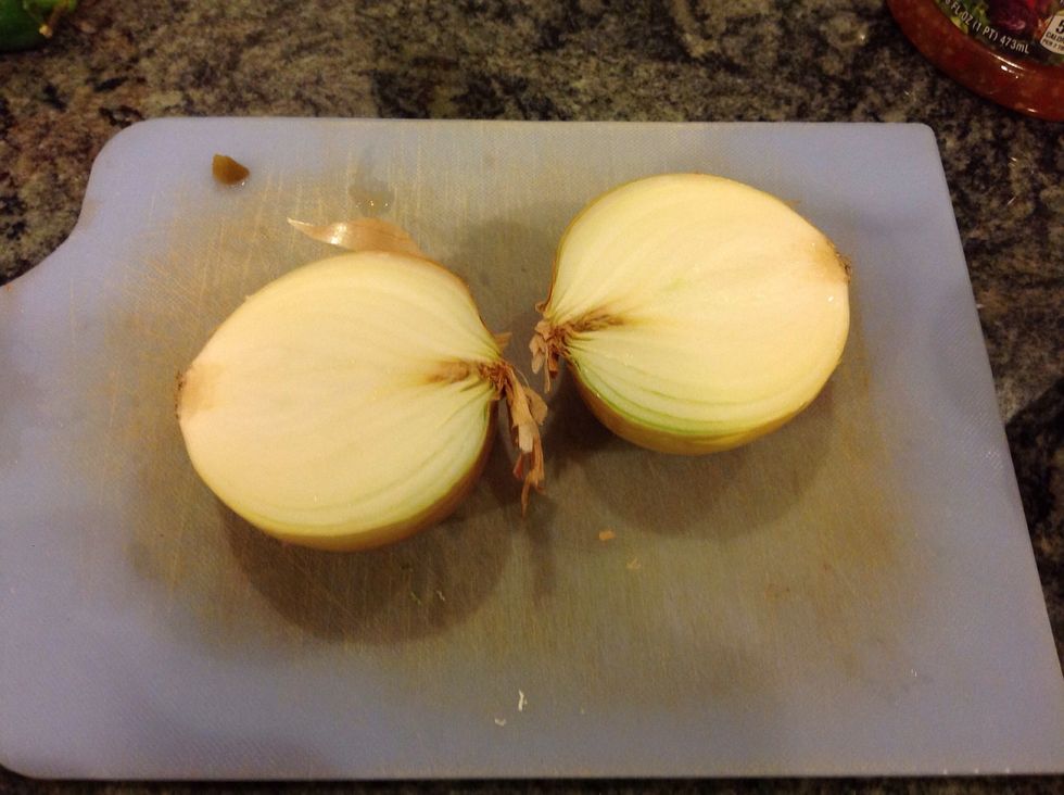 Cut your round onion in half.