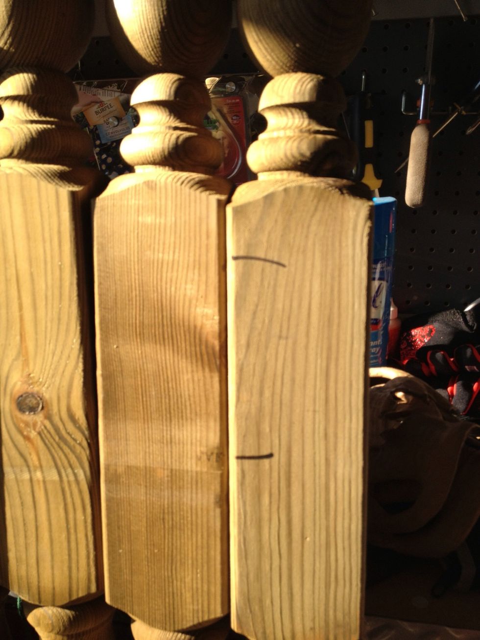 Cut your spindles and posts at varying lengths.