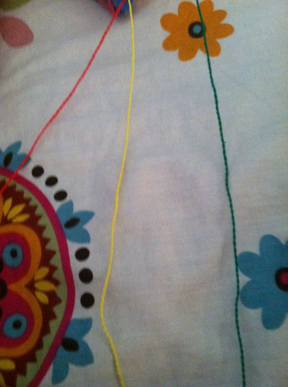 Cut your string so there all the same lengths