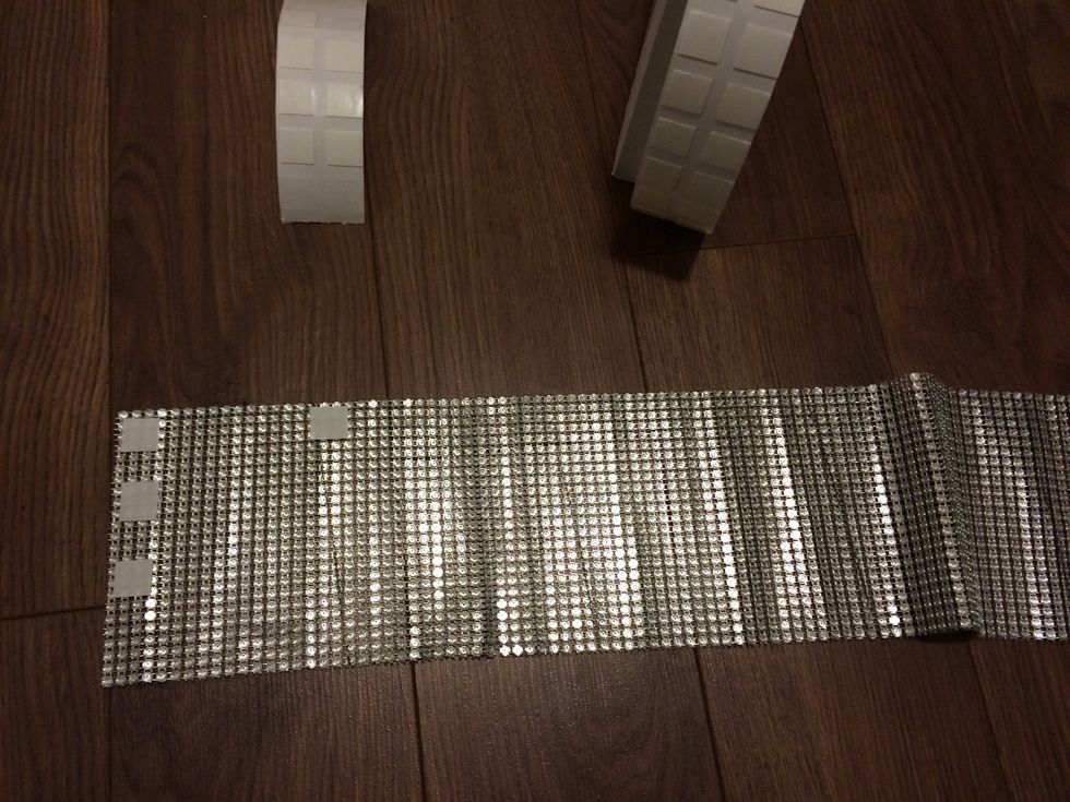 Cut your trim to the appropriate length. Next, place the adhesives on the mesh trim, I placed three squares down and 4-5 squares across all three rows.