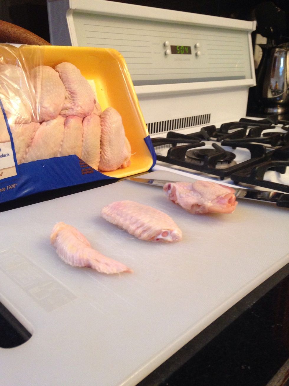 Cut your whole wings into 3 pieces , discard the wing tip.