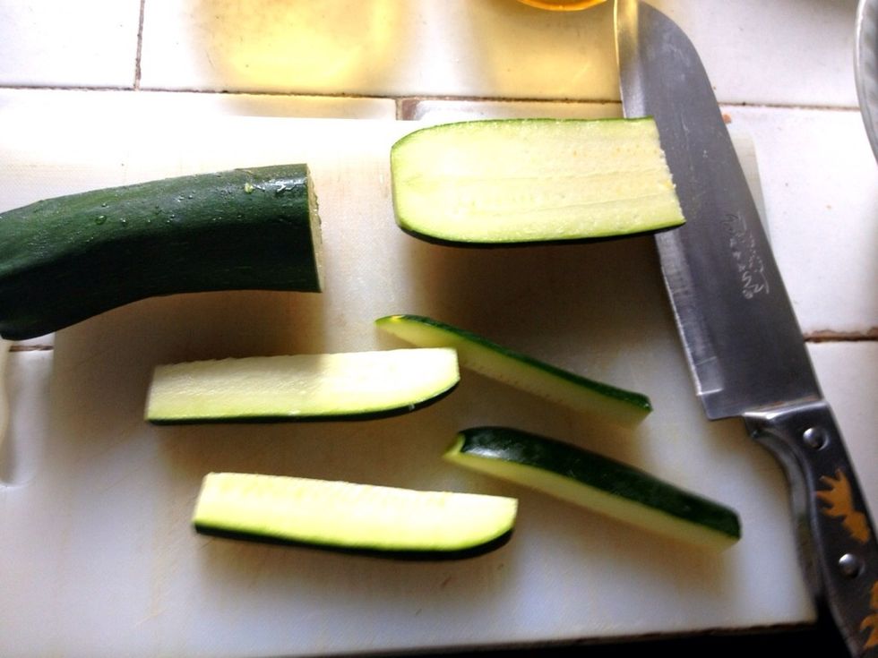 Cut your zucchini in half lengthwise. Cut into 16 sticks