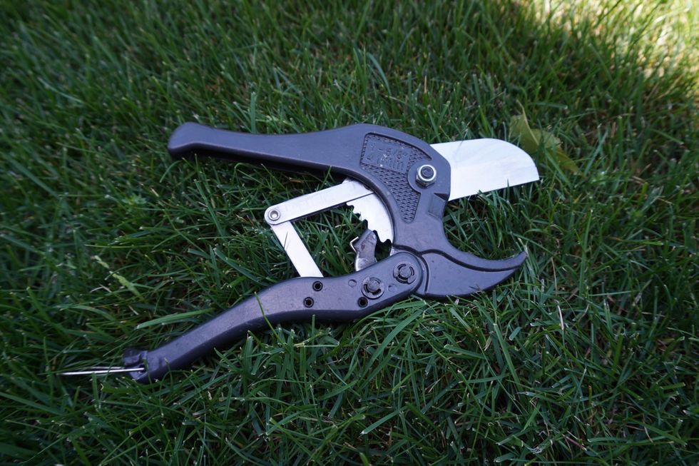 Cutting is made easy with a PVC pipe cutter. Worth the 12 bucks. Makes clean, straight, fast cuts, no burrs to gum up your sprinklers.