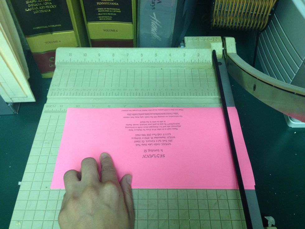 Cutting the 10 1/2 dimension. Take note that the paper is upside down. This is to make sure my words are in the center of the page! This is important!!!!