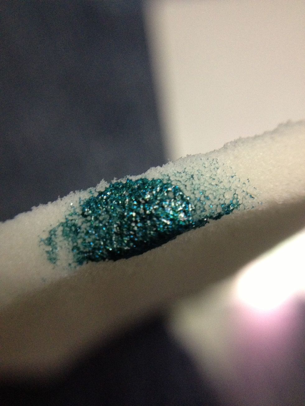 dab a cosmetic sponge onto the nail polish. make sure it's not soaked, just enough to add color on your nail.