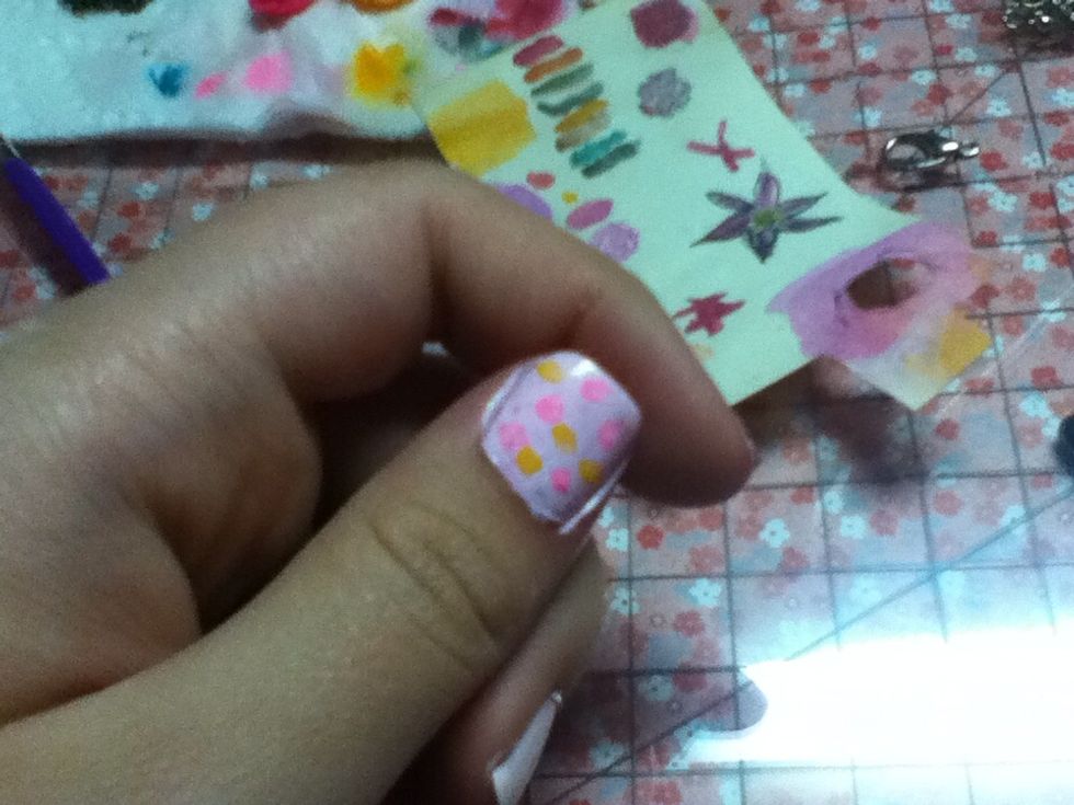 Dab blob & splatter marks all over the nail.