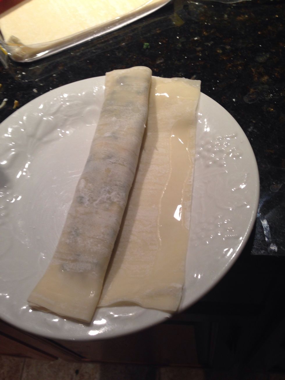 Dab some water on the edges. The water acts like glue.