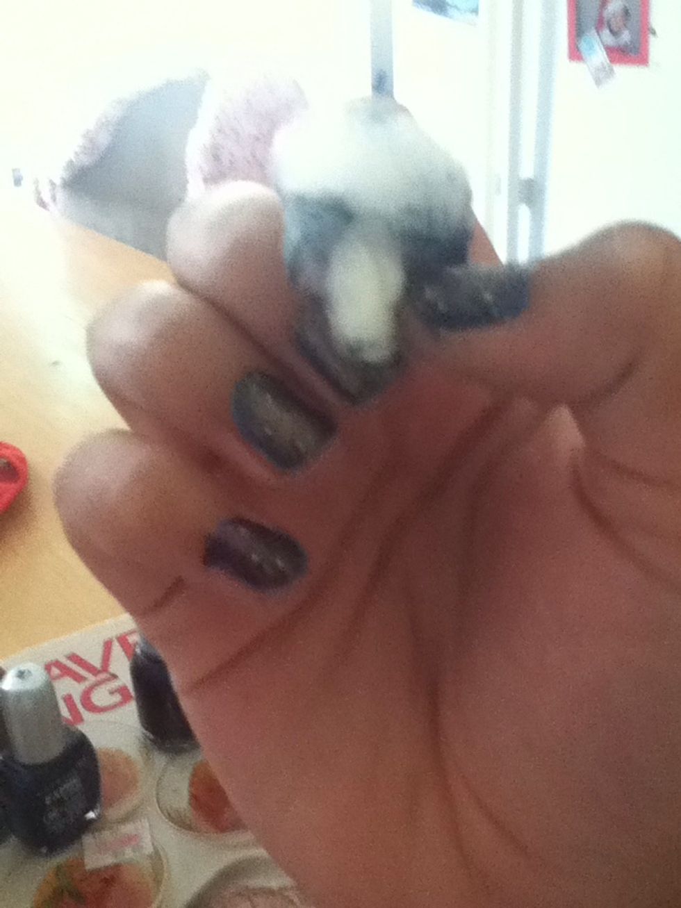 Dab the cotton wool on to the nail.
