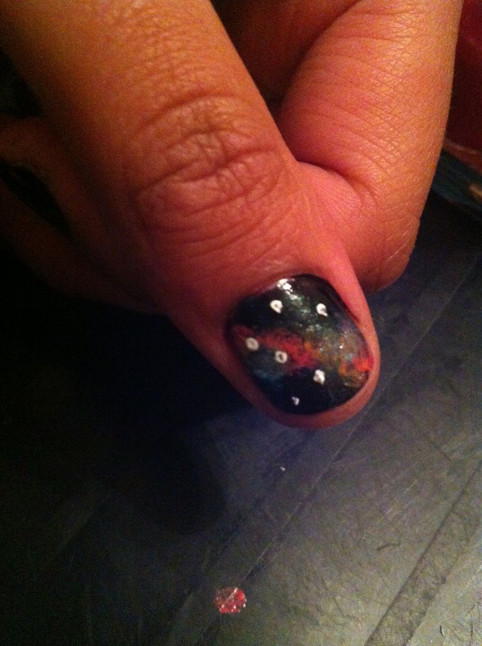 Dab the pin on your nail to create stars