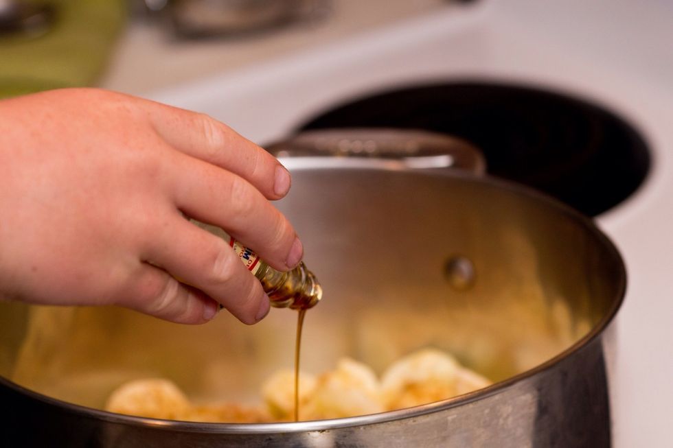 Dad won't let me have real rum so I'm using extract. But if your old enough, use a shot or two of good dark rum instead. You'll thank me later.  Oh and add the vanilla now too.