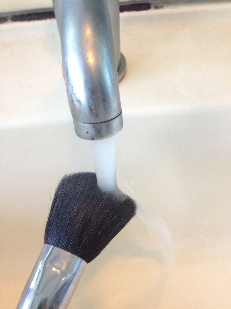 Damp your makeup brush