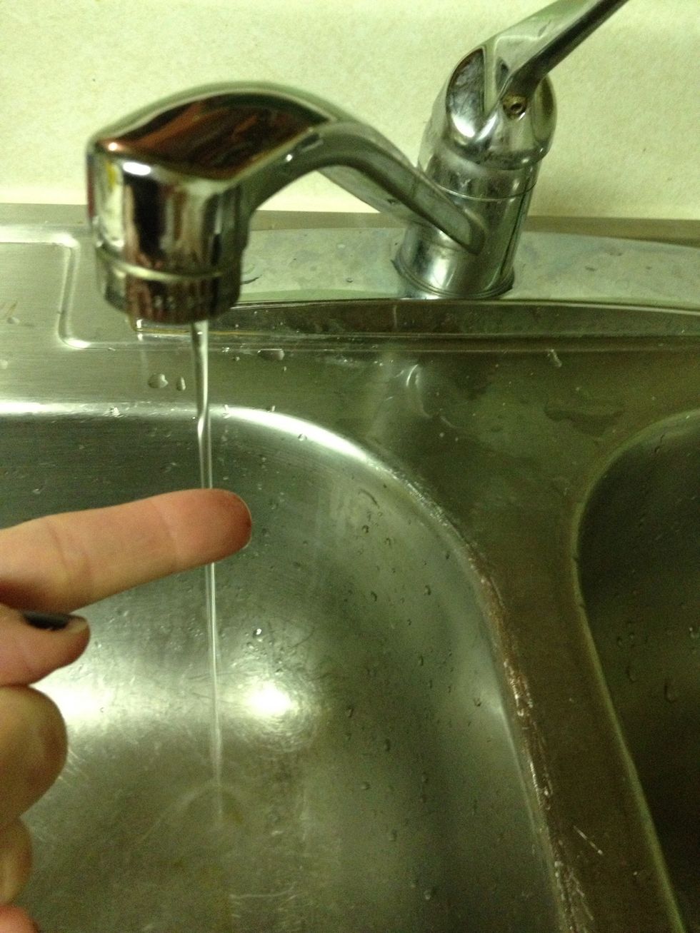 Dampen clean finger.