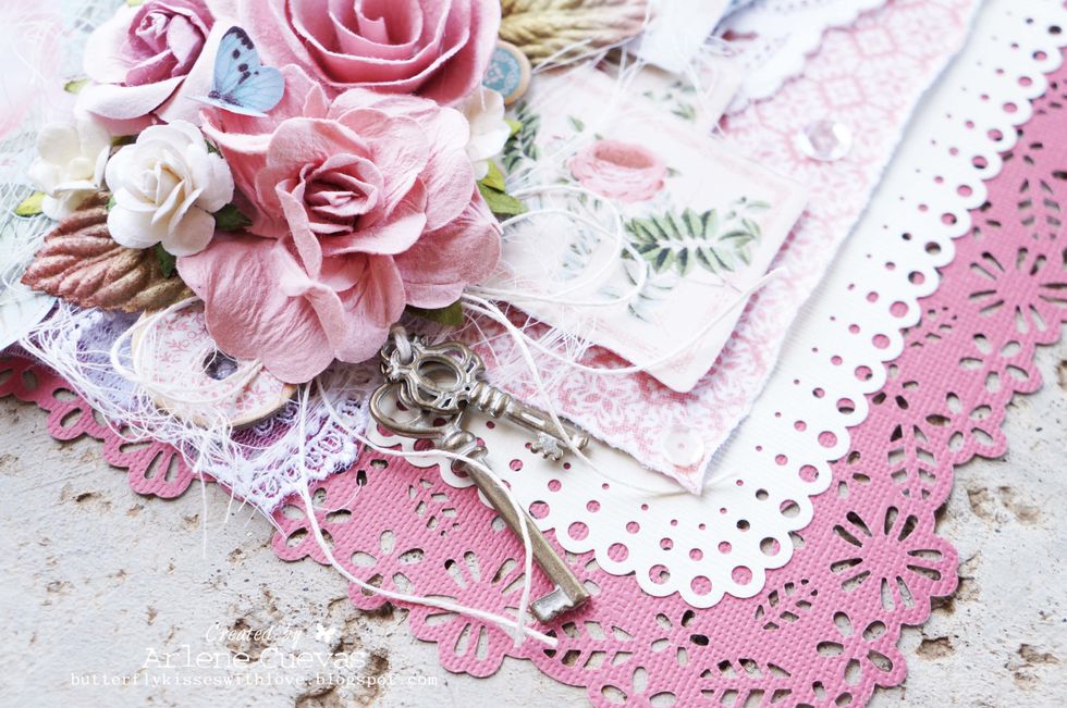 Dangle a few of the Shabby Chic Ornate Metal Keys from the cluster of flowers using twine...