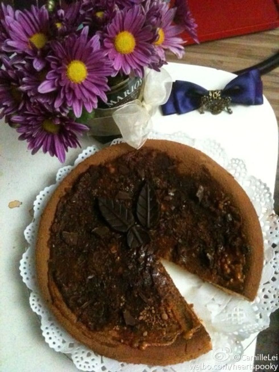 Dark chocolate. Cocoa powder. Make your chiffon cake look totally different. The vase was olive can, by the way the ribbon is handmade too :)